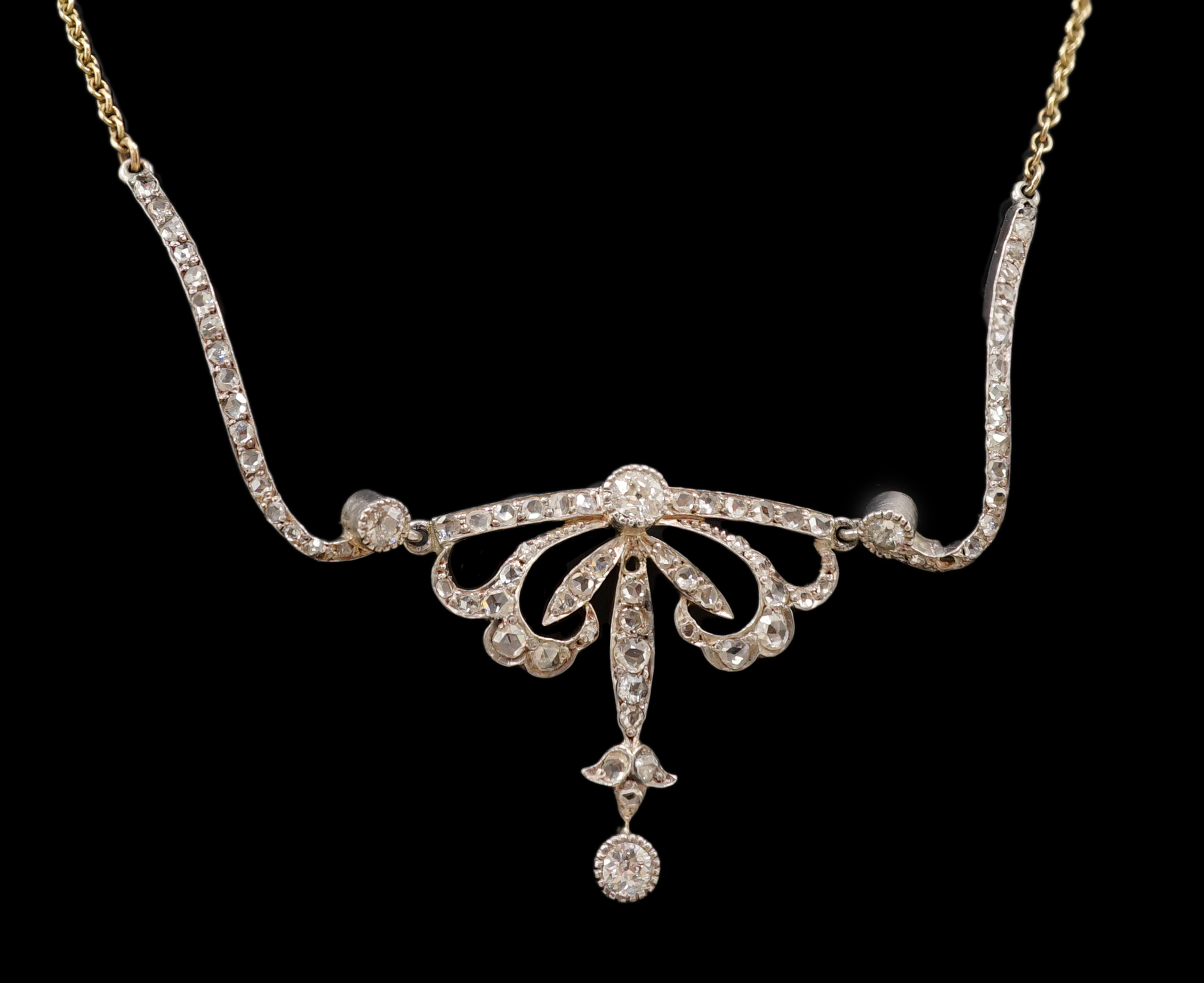 A Belle Epoque gold and silver, round and rose cut diamond cluster set pendant necklace